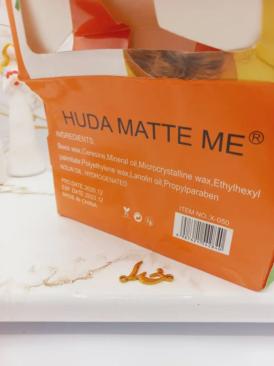 برق لب و لیپ گلاس درب هویج هدا مات می HUDA MATTE ME کد X050